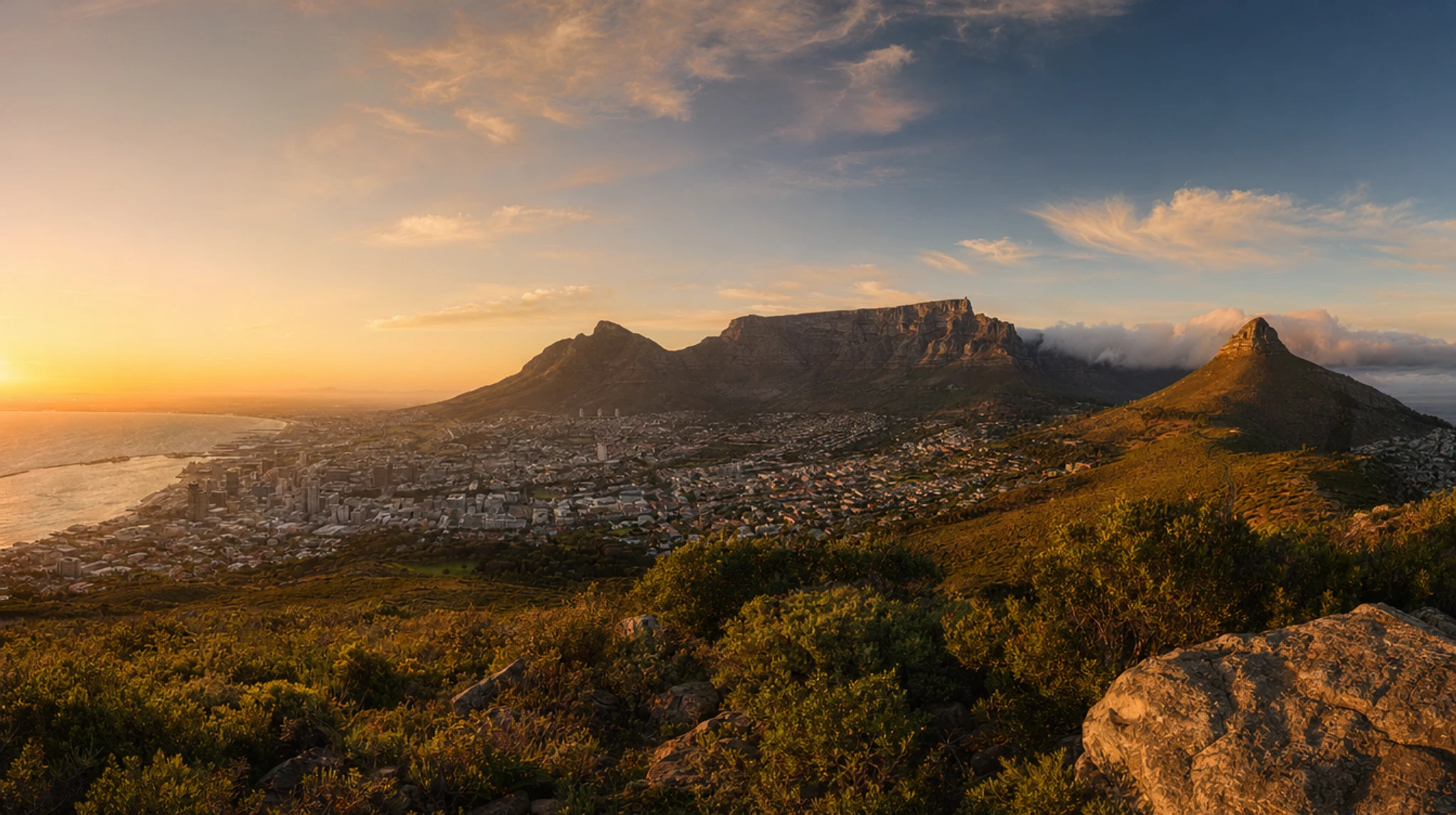 Table Mountain plateau rising above Cape Town and the harbour, South Africa