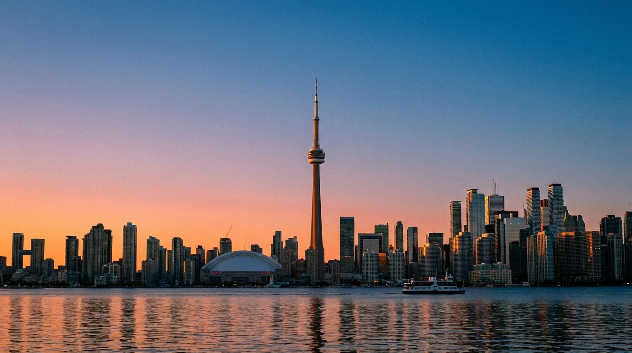 Toronto skyline with the CN Tower and downtown high-rises across Lake Ontario, Canada