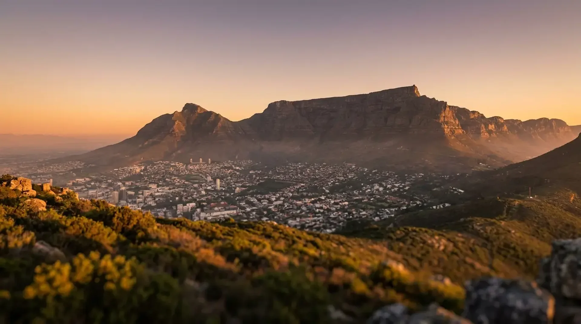 Cape Town harbour with Table Mountain rising above the V and A Waterfront, South Africa