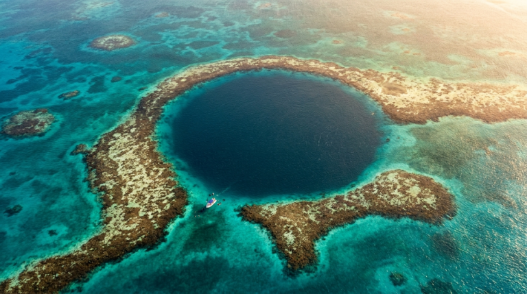 Aerial view of the Great Blue Hole and Lighthouse Reef atoll, Belize
