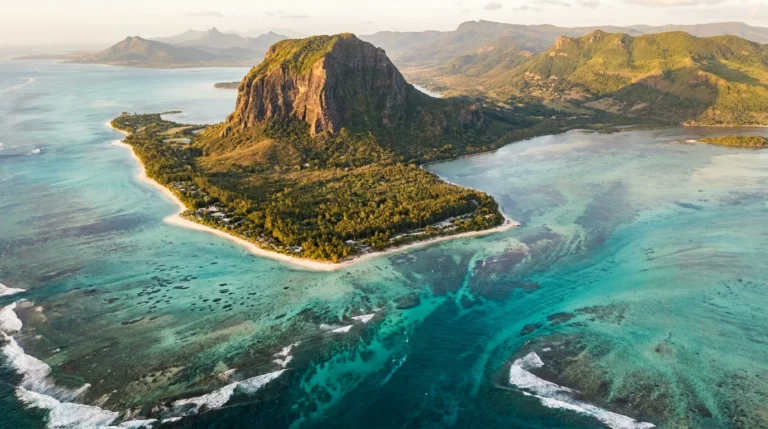 Le Morne Brabant, Mauritius — basalt peak above a turquoise lagoon, aerial