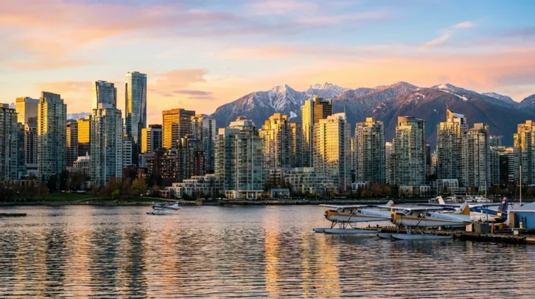 Vancouver, Canada — the downtown skyline and North Shore mountains over Coal Harbour