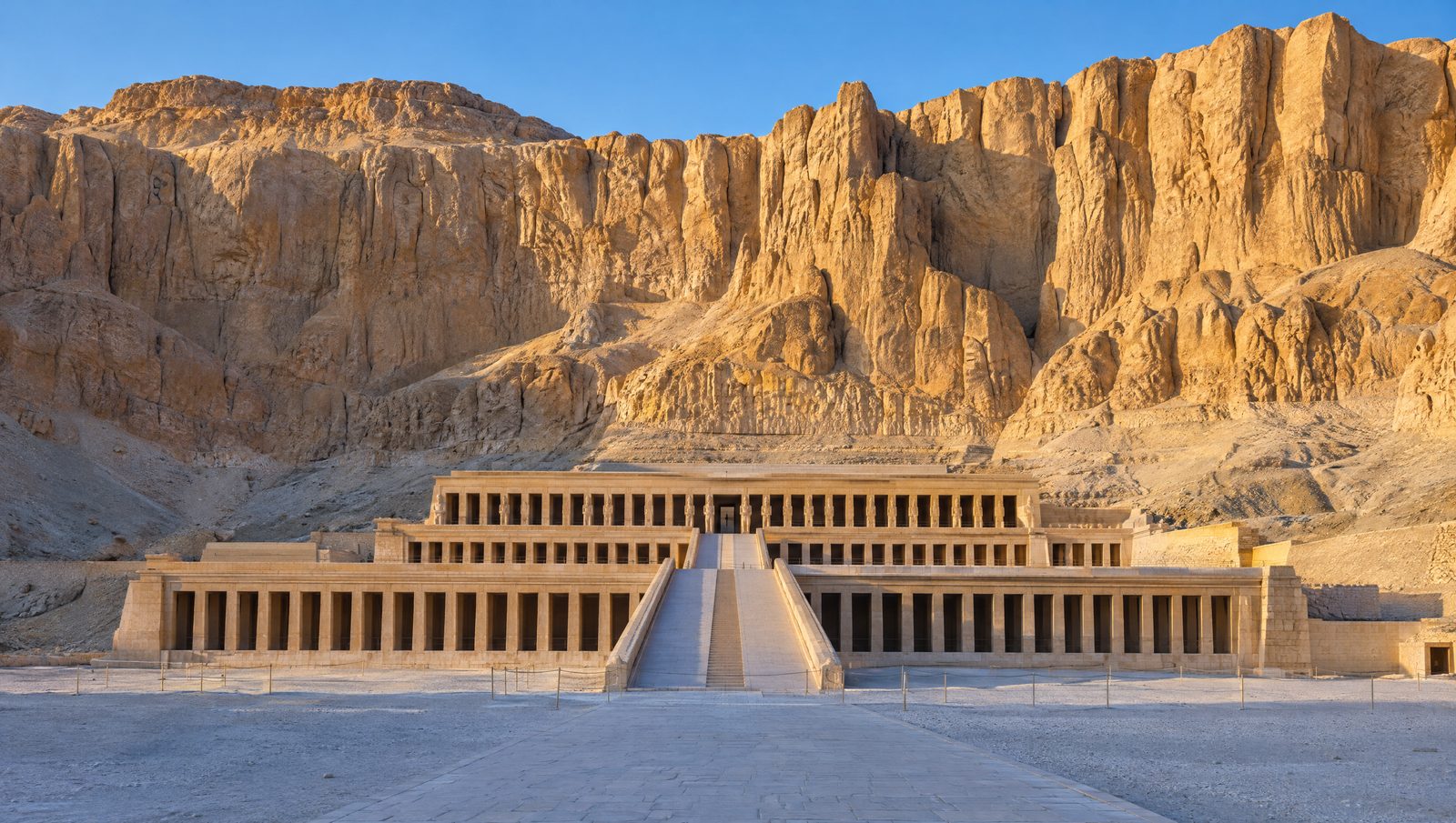 The three colonnaded terraces of Hatshepsut's temple at Deir el-Bahari set against the golden cliffs of the Theban west bank